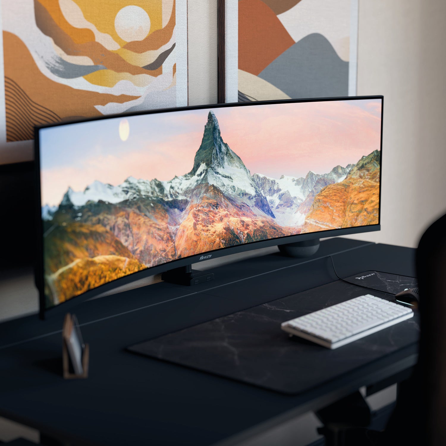 An Arozzi Nova 49″ Curved VA 165Hz Ultrawide Gaming Monitor sits on a desk, showcasing a mountain landscape across its immersive curved screen, which features adaptive sync technology and an ultra-smooth 165Hz refresh rate. Below the monitor, a white keyboard, mouse, and desk mat are neatly arranged, with abstract art adorning the wall behind.